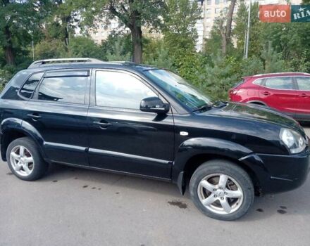 Черный Хендай Туксон, объемом двигателя 1.98 л и пробегом 195 тыс. км за 6981 $, фото 7 на Automoto.ua