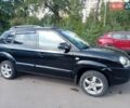 Черный Хендай Туксон, объемом двигателя 1.98 л и пробегом 195 тыс. км за 6981 $, фото 7 на Automoto.ua