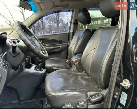 Черный Хендай Туксон, объемом двигателя 2 л и пробегом 218 тыс. км за 8600 $, фото 11 на Automoto.ua