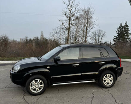 Черный Хендай Туксон, объемом двигателя 2 л и пробегом 210 тыс. км за 7850 $, фото 10 на Automoto.ua