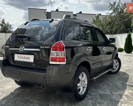 Черный Хендай Туксон, объемом двигателя 2 л и пробегом 67 тыс. км за 9999 $, фото 55 на Automoto.ua