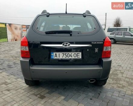 Чорний Хендай Туксон, об'ємом двигуна 2 л та пробігом 225 тис. км за 8000 $, фото 8 на Automoto.ua