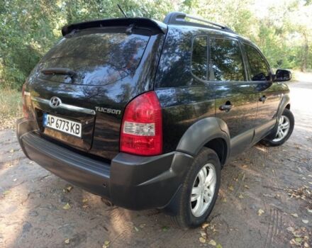 Чорний Хендай Туксон, об'ємом двигуна 2 л та пробігом 270 тис. км за 8000 $, фото 3 на Automoto.ua
