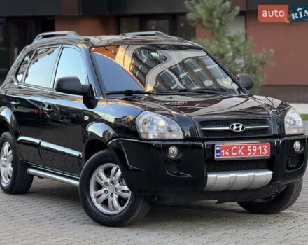 Чорний Хендай Туксон, об'ємом двигуна 2 л та пробігом 156 тис. км за 7850 $, фото 4 на Automoto.ua