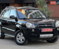 Чорний Хендай Туксон, об'ємом двигуна 2 л та пробігом 156 тис. км за 7850 $, фото 4 на Automoto.ua