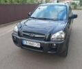 Черный Хендай Туксон, объемом двигателя 2 л и пробегом 168 тыс. км за 9000 $, фото 2 на Automoto.ua