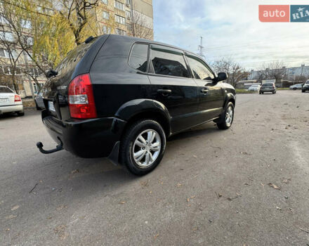 Черный Хендай Туксон, объемом двигателя 1.98 л и пробегом 196 тыс. км за 7999 $, фото 8 на Automoto.ua