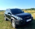 Черный Хендай Туксон, объемом двигателя 2 л и пробегом 215 тыс. км за 8500 $, фото 1 на Automoto.ua