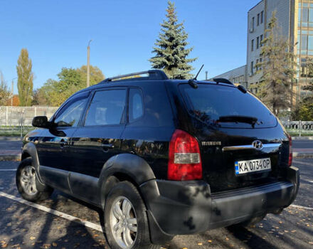 Черный Хендай Туксон, объемом двигателя 1.98 л и пробегом 218 тыс. км за 7200 $, фото 3 на Automoto.ua