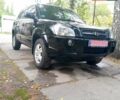 Черный Хендай Туксон, объемом двигателя 2 л и пробегом 224 тыс. км за 7900 $, фото 1 на Automoto.ua