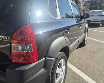 Черный Хендай Туксон, объемом двигателя 1.98 л и пробегом 93 тыс. км за 11800 $, фото 1 на Automoto.ua