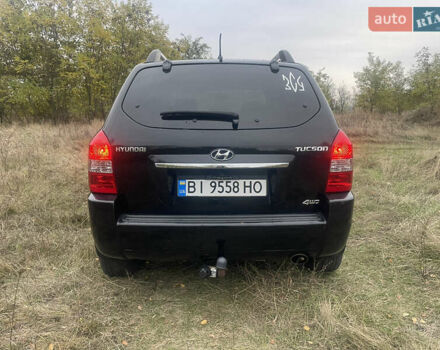 Хендай Туксон 2008 у Лубнах на Automoto.ua Чорний Хендай Туксон, об'ємом двигуна 1.98 л та пробігом 235 тис. км за 6999 $, фото 4 на Automoto.ua
