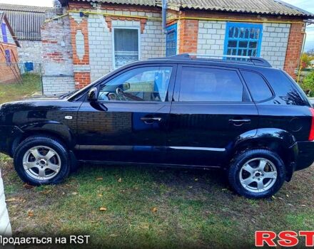 Черный Хендай Туксон, объемом двигателя 2 л и пробегом 187 тыс. км за 7900 $, фото 2 на Automoto.ua