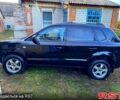 Черный Хендай Туксон, объемом двигателя 2 л и пробегом 187 тыс. км за 7900 $, фото 2 на Automoto.ua