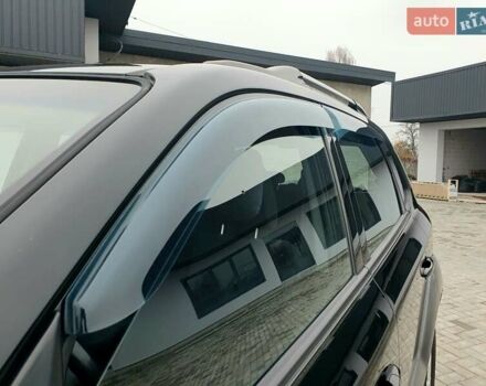 Чорний Хендай Туксон, об'ємом двигуна 2 л та пробігом 225 тис. км за 8000 $, фото 20 на Automoto.ua