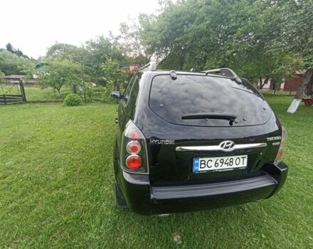 Черный Хендай Туксон, объемом двигателя 2 л и пробегом 220 тыс. км за 8200 $, фото 5 на Automoto.ua