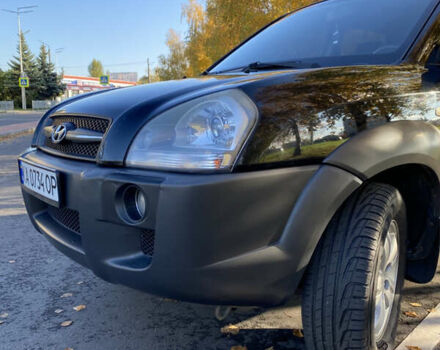 Черный Хендай Туксон, объемом двигателя 1.98 л и пробегом 218 тыс. км за 7200 $, фото 27 на Automoto.ua