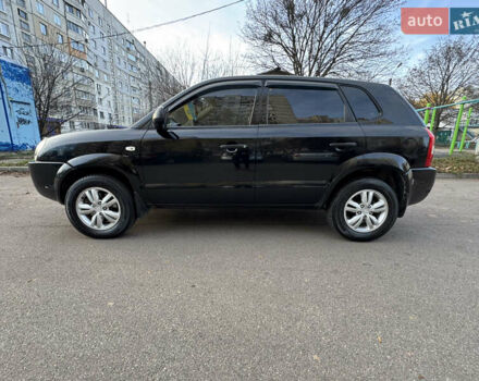 Черный Хендай Туксон, объемом двигателя 1.98 л и пробегом 196 тыс. км за 7999 $, фото 3 на Automoto.ua