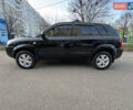 Черный Хендай Туксон, объемом двигателя 1.98 л и пробегом 196 тыс. км за 7999 $, фото 3 на Automoto.ua