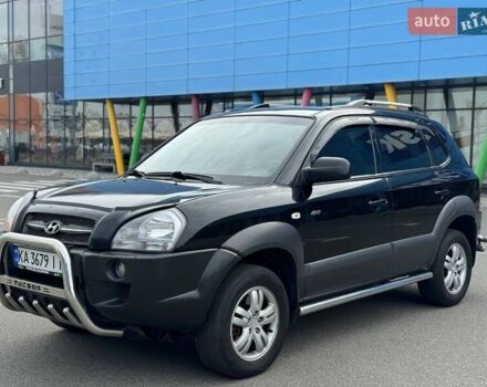 Черный Хендай Туксон, объемом двигателя 1.98 л и пробегом 202 тыс. км за 8350 $, фото 6 на Automoto.ua