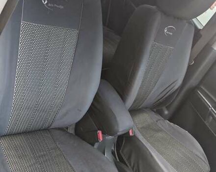 Черный Хендай Туксон, объемом двигателя 2 л и пробегом 163 тыс. км за 8100 $, фото 2 на Automoto.ua