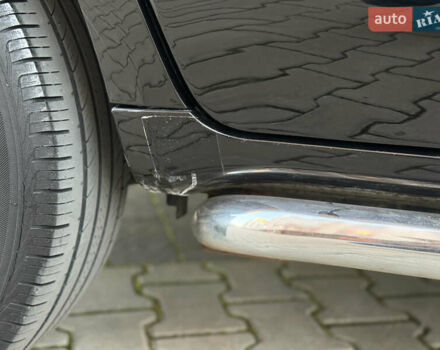 Чорний Хендай Туксон, об'ємом двигуна 2 л та пробігом 156 тис. км за 7850 $, фото 57 на Automoto.ua