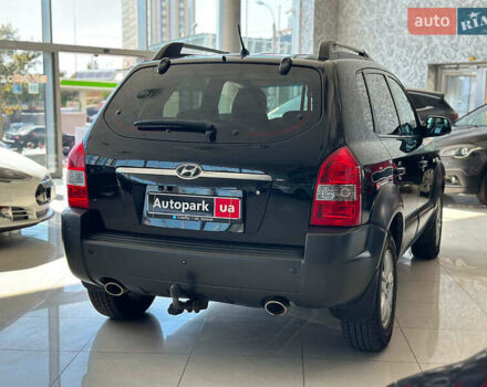 Черный Хендай Туксон, объемом двигателя 2.7 л и пробегом 158 тыс. км за 7940 $, фото 7 на Automoto.ua