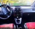 Черный Хендай Туксон, объемом двигателя 2 л и пробегом 187 тыс. км за 7900 $, фото 6 на Automoto.ua