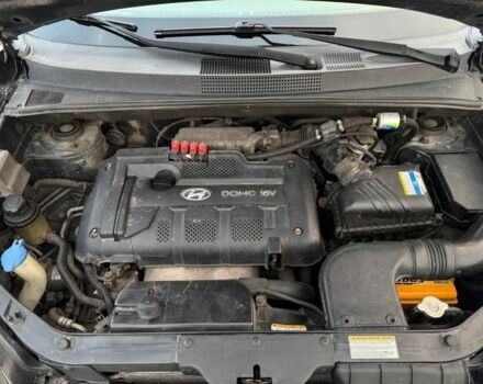 Черный Хендай Туксон, объемом двигателя 2 л и пробегом 353 тыс. км за 6800 $, фото 14 на Automoto.ua