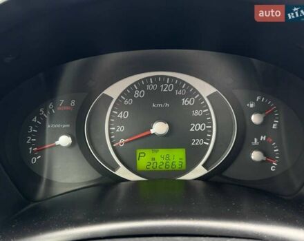 Черный Хендай Туксон, объемом двигателя 1.98 л и пробегом 202 тыс. км за 8350 $, фото 12 на Automoto.ua