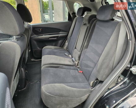 Черный Хендай Туксон, объемом двигателя 2 л и пробегом 137 тыс. км за 8400 $, фото 29 на Automoto.ua