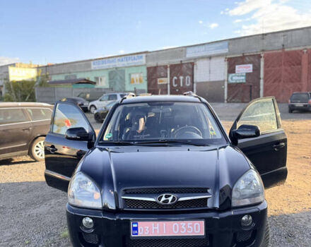 Черный Хендай Туксон, объемом двигателя 2 л и пробегом 215 тыс. км за 7900 $, фото 23 на Automoto.ua
