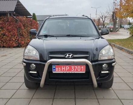 Черный Хендай Туксон, объемом двигателя 1.98 л и пробегом 214 тыс. км за 7700 $, фото 5 на Automoto.ua