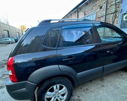 Черный Хендай Туксон, объемом двигателя 2 л и пробегом 220 тыс. км за 7000 $, фото 2 на Automoto.ua