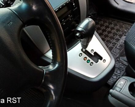 Чорний Хендай Туксон, об'ємом двигуна 2 л та пробігом 188 тис. км за 8800 $, фото 9 на Automoto.ua