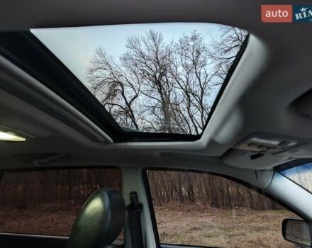 Черный Хендай Туксон, объемом двигателя 2 л и пробегом 182 тыс. км за 9000 $, фото 13 на Automoto.ua