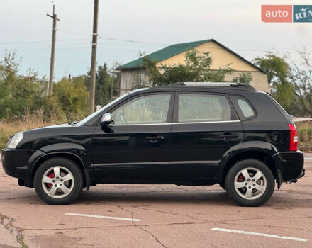 Черный Хендай Туксон, объемом двигателя 2 л и пробегом 361 тыс. км за 6499 $, фото 1 на Automoto.ua