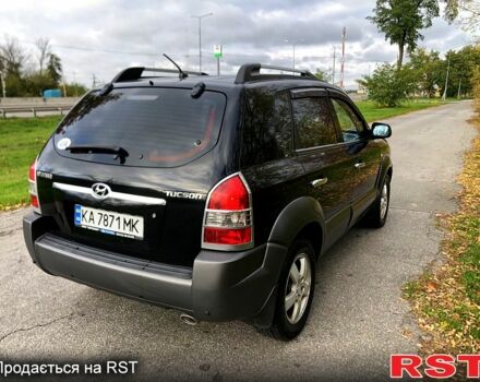 Черный Хендай Туксон, объемом двигателя 2 л и пробегом 220 тыс. км за 8000 $, фото 4 на Automoto.ua