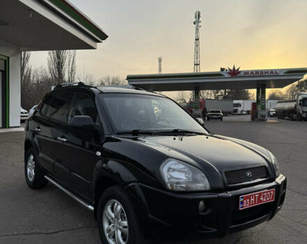 Черный Хендай Туксон, объемом двигателя 2 л и пробегом 210 тыс. км за 7850 $, фото 8 на Automoto.ua