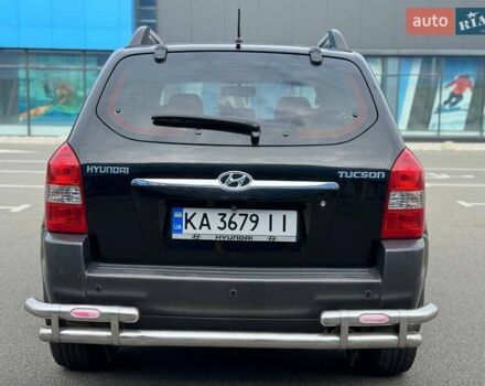 Черный Хендай Туксон, объемом двигателя 1.98 л и пробегом 202 тыс. км за 8350 $, фото 8 на Automoto.ua