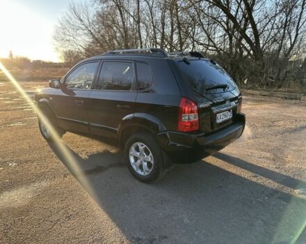 Черный Хендай Туксон, объемом двигателя 2 л и пробегом 205 тыс. км за 8400 $, фото 3 на Automoto.ua