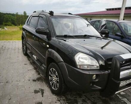 Черный Хендай Туксон, объемом двигателя 1.98 л и пробегом 189 тыс. км за 7800 $, фото 16 на Automoto.ua