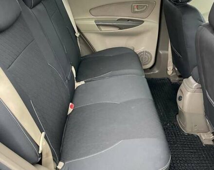 Черный Хендай Туксон, объемом двигателя 1.98 л и пробегом 290 тыс. км за 7000 $, фото 2 на Automoto.ua