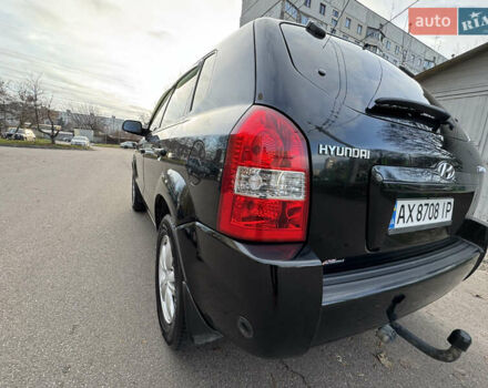 Черный Хендай Туксон, объемом двигателя 1.98 л и пробегом 196 тыс. км за 7999 $, фото 5 на Automoto.ua