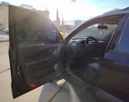 Черный Хендай Туксон, объемом двигателя 2 л и пробегом 82 тыс. км за 7490 $, фото 13 на Automoto.ua