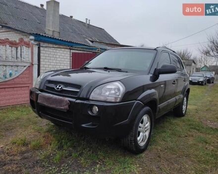 Черный Хендай Туксон, объемом двигателя 2 л и пробегом 237 тыс. км за 7500 $, фото 2 на Automoto.ua