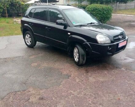 Чорний Хендай Туксон, об'ємом двигуна 2 л та пробігом 225 тис. км за 7850 $, фото 19 на Automoto.ua