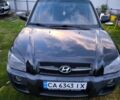Черный Хендай Туксон, объемом двигателя 2 л и пробегом 240 тыс. км за 8000 $, фото 2 на Automoto.ua
