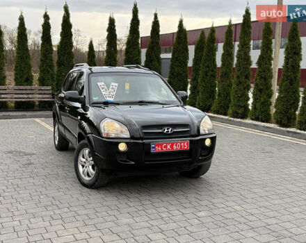 Черный Хендай Туксон, объемом двигателя 1.98 л и пробегом 205 тыс. км за 7950 $, фото 1 на Automoto.ua