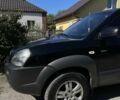 Черный Хендай Туксон, объемом двигателя 2 л и пробегом 334 тыс. км за 8700 $, фото 22 на Automoto.ua